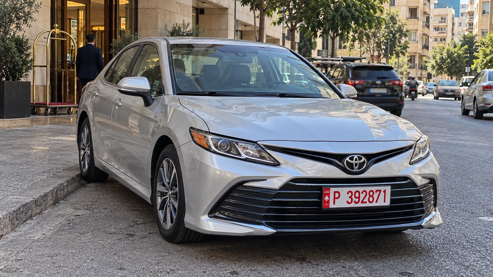 Toyota Camry Lebanese sedan taxi at a Beirut hotel, illustrating private airport arrivals to Sassine Achrafieh